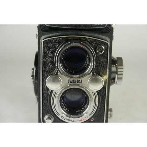 6051 - A cased Yashica-Mat TLR Medium Format Film Camera SR MT4060027 w/80mm lens & accessories