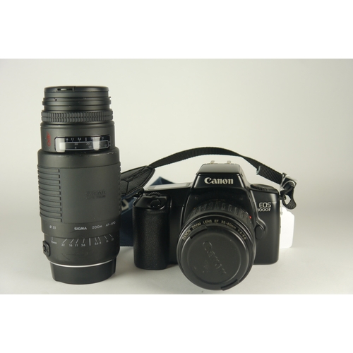 6088 - A Canon EOS 1000F 35mm SLR w/Canon Zoom lens EF 35-80mm F4-5.6 & Sigma 75-300mm f/4.5-5.6 Zoom Lens ... 