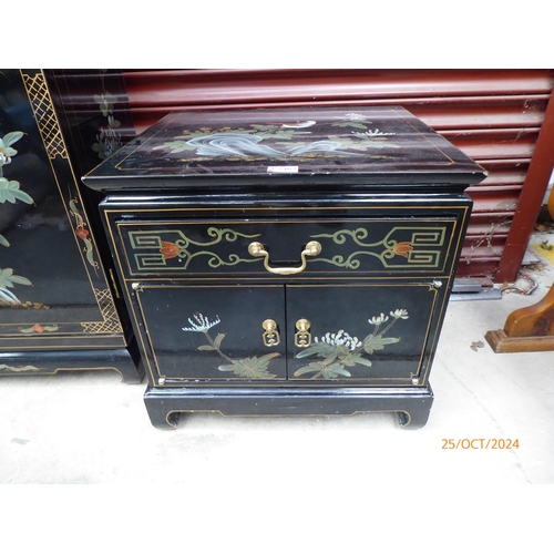 2462 - An Oriental bedside cabinet