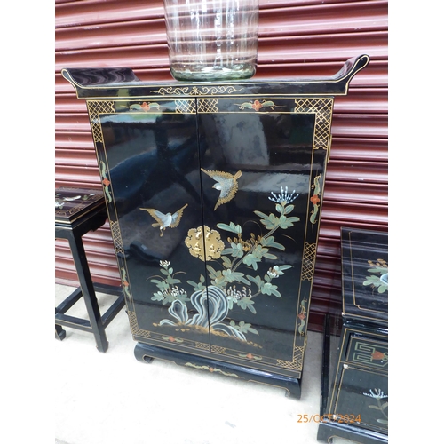 2463 - An Oriental two door cabinet