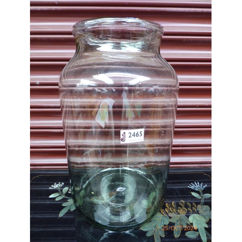 2465 - A hand thrown glass vase