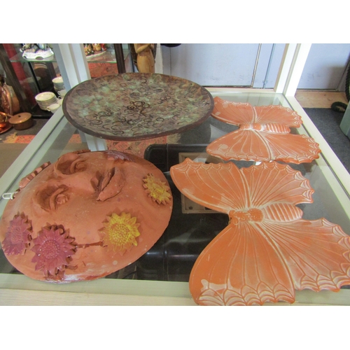 1507 - A collection of Studio pottery including wall charger, butterflies, etc. (4)