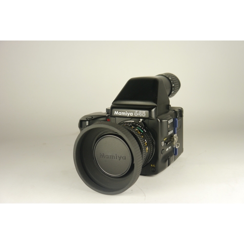 6004 - A Mamiya 645 Pro TL Medium Format 120 film camera w/ Mamiya AE Metered Prism Finder FK402 & Power Dr... 