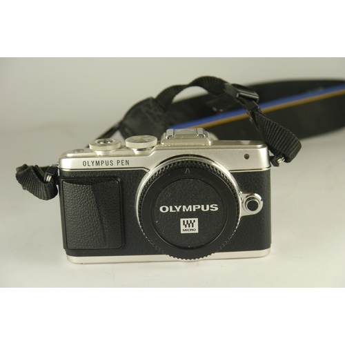 6010 - A Olympus Pen Lite E-PL7 Digital Camera, body only & charger