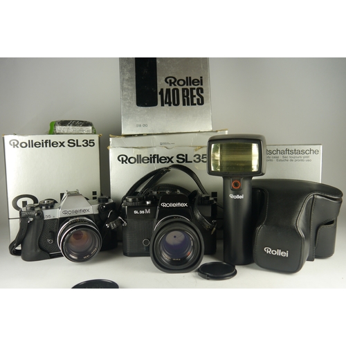 6030 - Two Rolleiflex 35mm film cameras including models SL35 & SL35M, all items are in original boxes w/ R... 