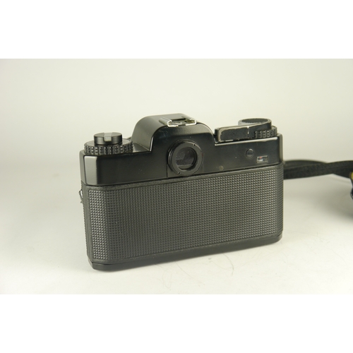 6030 - Two Rolleiflex 35mm film cameras including models SL35 & SL35M, all items are in original boxes w/ R... 