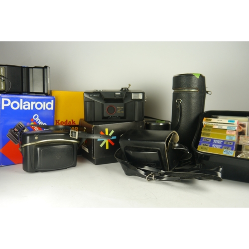 6096 - A box of mixed camera accessories including two Derek Gardner lenses & a Polaroid One Step Flash