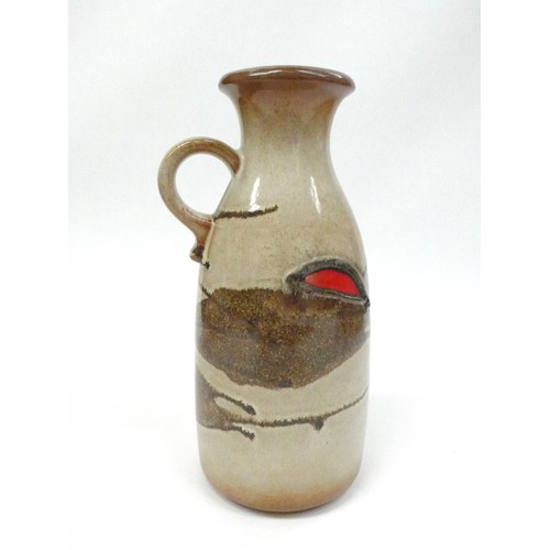 7005 - A Scheurich West German pottery vase with single handle in stone colour glazes and red flashes no.49... 