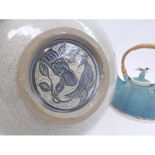 7064 - A Mike Goddard studio pottery bowl with carved birds and folkart design, 11cm high x 25cm diameter t... 