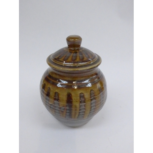 7057 - SETH CARDEW (1934-2016) A studio pottery lidded jar for Wenford Bridge Pottery with impressed potter... 