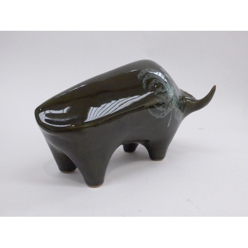 7014 - A Lotus Pottery large bull figurine by Elizabeth Skipworth, 23cm long x 13.3cm high  