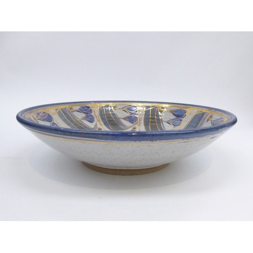 7063 - A David Morris large studio pottery bowl with abstract gold decoration , potters mark and gallery la... 