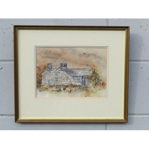 7615 - EDWARD MORRIS (XX/XXI) A framed watercolour of a cottage, signed lower left with artists label verso... 