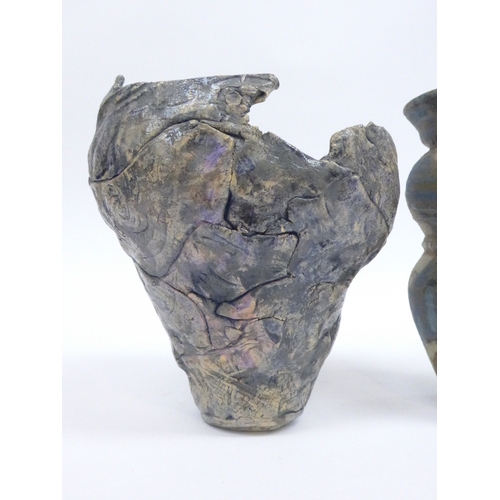 7128 - A studio pottery vase of abstract form in the manner of Ewen Henderson, and a studio pottery vase si... 