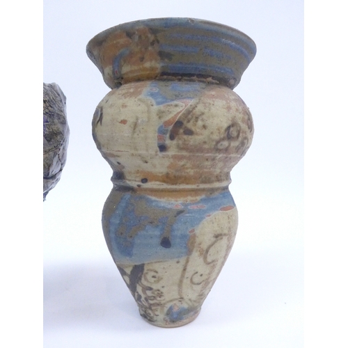 7128 - A studio pottery vase of abstract form in the manner of Ewen Henderson, and a studio pottery vase si... 