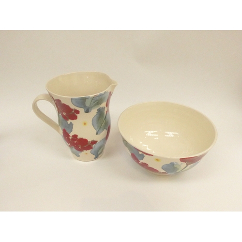 7098 - A Janice Tchalenko pottery large Poppy design pitcher and a bowl, tallest 20.5cm (2)