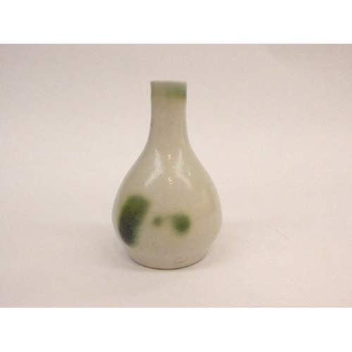 7139 - WILLIAM 'BILL' MARSHALL (1923-2007) A studio pottery small vase with green and white decoration, imp... 