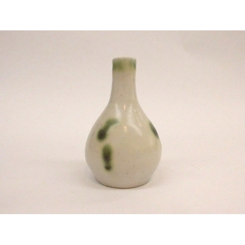 7139 - WILLIAM 'BILL' MARSHALL (1923-2007) A studio pottery small vase with green and white decoration, imp... 