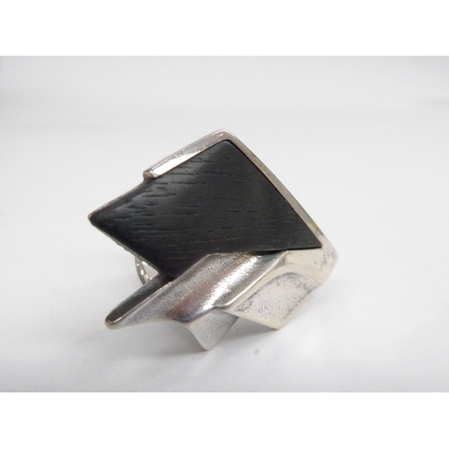 7343 - A Lapponia sterling silver and ebony ring and matching earrings designed by Zoltan Popovits , made i... 