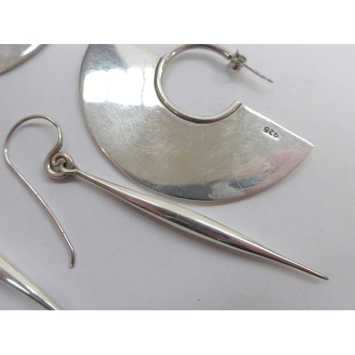 7330 - A pair of fan shaped earrings stamped 925 and a pair of slender drop earrings