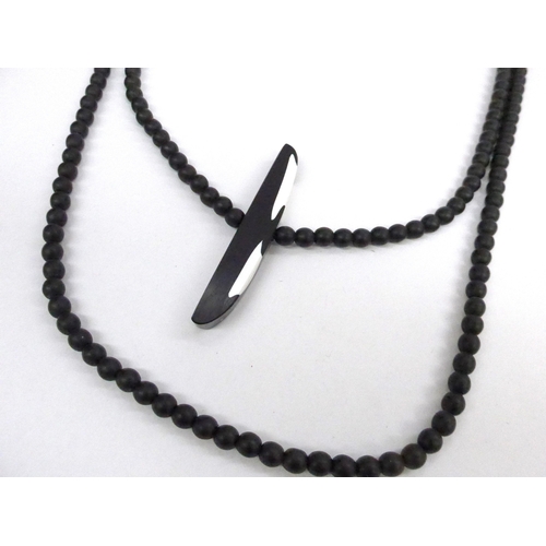 7362 - Marina and Susanna Sent murano black glass bead necklace with black and white abstract centrepiece