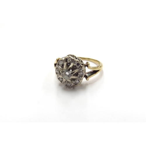 9164 - A diamond cluster ring with open shoulders, unmarked. Size K, 4.4g