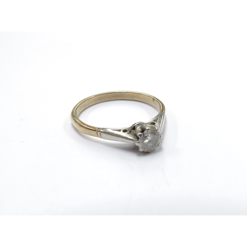 9169 - A diamond solitaire ring 0.25ct approx, shank stamped 18ct. Size O, 2.3g