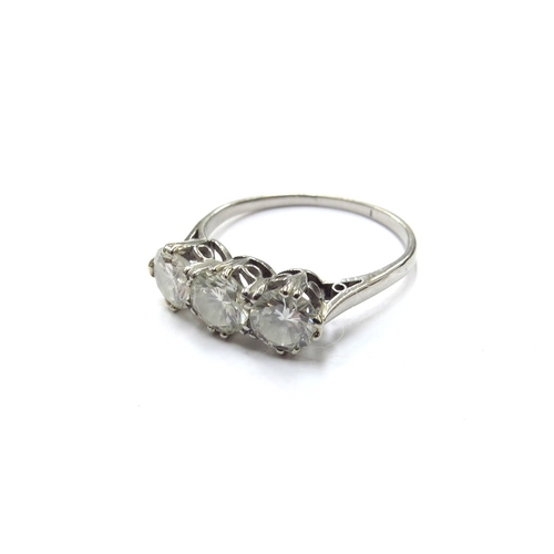 9113 - A platinum three stone diamond ring 1.80ct total approx. Size R, 3.7g