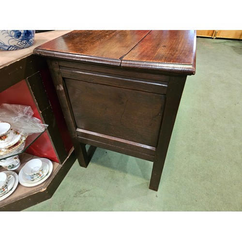 4009 - A circa 1780 pegged joined oak coffer, the split ring hinged top with internal candle/taper box over... 