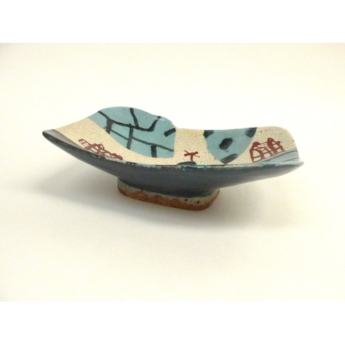 7152 - JOHN MALTBY (1936-2020) Footed stoneware dish with abstract glazed pattern.  Painted signature to ba... 