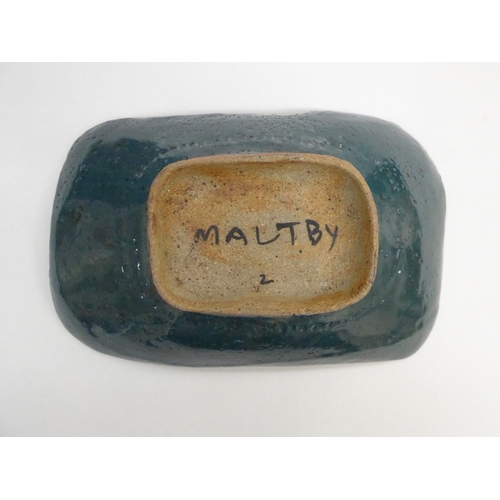 7152 - JOHN MALTBY (1936-2020) Footed stoneware dish with abstract glazed pattern.  Painted signature to ba... 