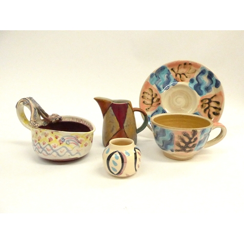 7121 - Four pieces of Studio pottery including a David Cleverly sauce boat, a Petra Tilly quilt pattern jug... 