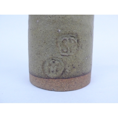 7141 - JOHN MALTBY (1936-2020) A Stoneshill pottery cylindrical vase with found iron loop handles. Impresse... 