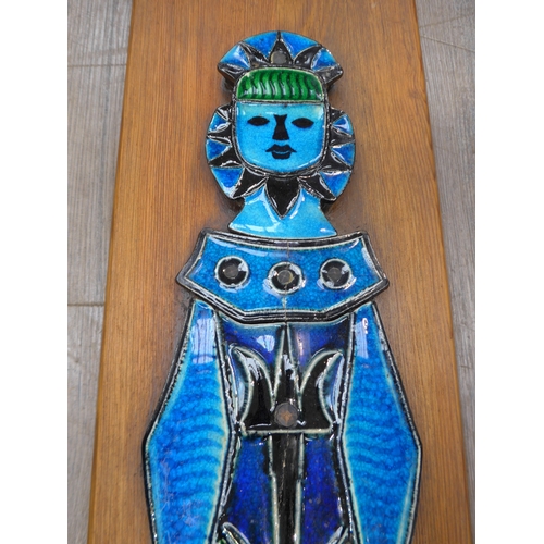 7229 - KONRAD GALAAEN (1923-2004) Porsgrund Norway, A ceramic figural wall tile with blue glazes. mounted o... 