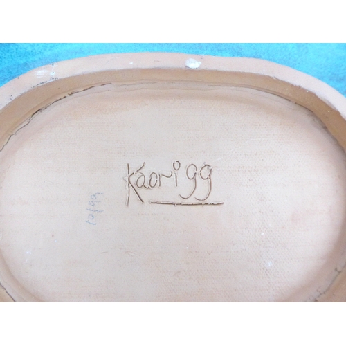 7126 - A studio pottery slab built dish with impressed motifs signed to base Kaori '99 33x21cm