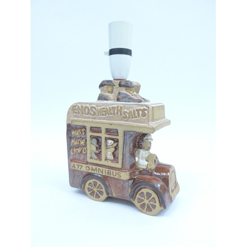 7079 - A Tremaen pottery lamp base in the form of a bus 25.5cm high including fitting