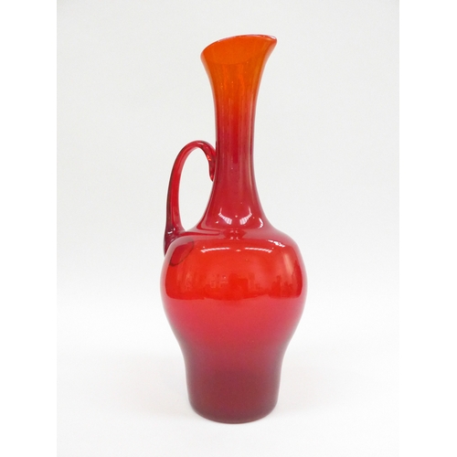 7240 - Attributed to Zebigniew Horobowy a red art glass pitcher with single handle. Polished pontil 37.5cm ... 