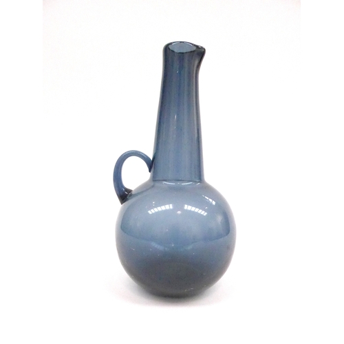 7321 - A Tamara Aladin carafe in midnight blue glass, model number 1747 20.5cm high