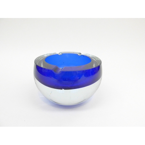 7300 - A Murano clear and blue glass heavy bowl/ashtray, 9.5cm high x 14.5cm diameter (internal chip)