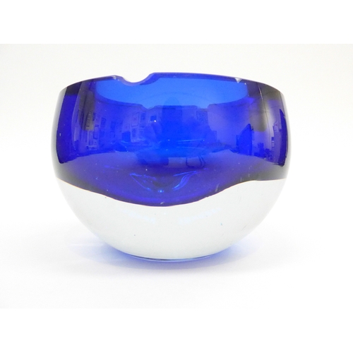 7300 - A Murano clear and blue glass heavy bowl/ashtray, 9.5cm high x 14.5cm diameter (internal chip)