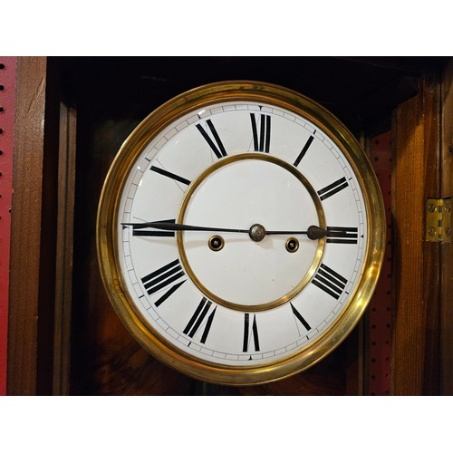 4024 - A late 19th Century walnut cased Vienna regulator wall clock with two train movement striking on a c... 