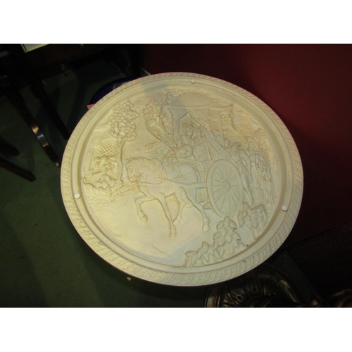 4053 - A resin tripod table embossed with oriental figures in carriage 44cm diameter (no glass), 48cm tall