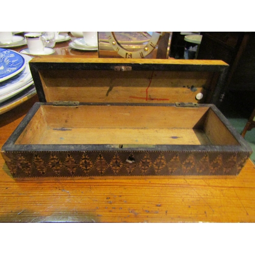 4059 - A Tunbridge Ware pencil box with geometric design, hinges a/f