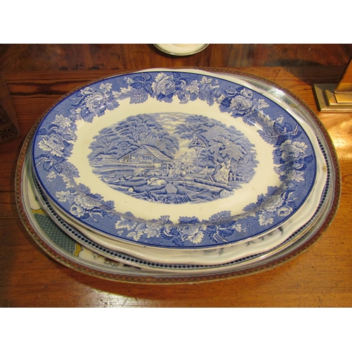 4067 - Four platters including a George Sharpe meat platter, two Wood & Sons platters and a Trentham platte... 