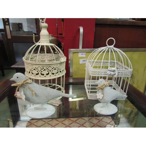 4113 - Two painted metal bird cages with dome-shaped lids, together with two metal birds