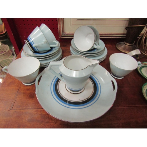 4121 - A Noritake blue and white deco tea-set and a foreign example