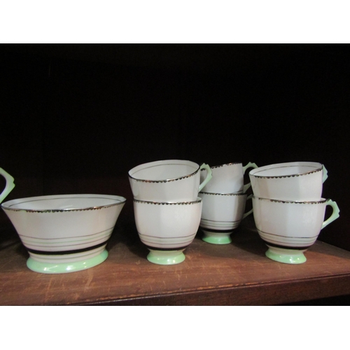 4135 - A Wedgewood green banded tea set with Tuscan china 'Plant' tea wares