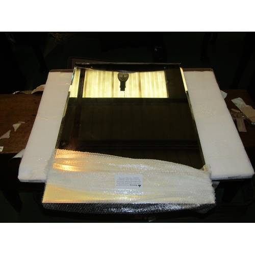 4180 - A boxed bevel edge mirror, 70cm x 50cm