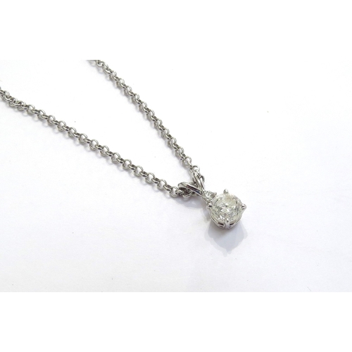 9136 - A two stone diamond drop pendant, one round brilliant cut stone 1.08ct approx in four claws with 0.0... 