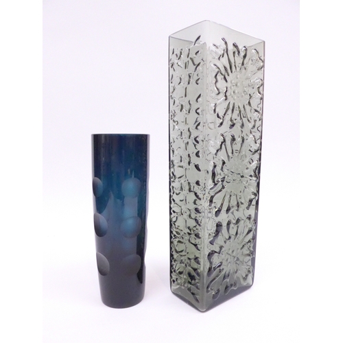 7288 - An Ingrid Morche smoked glass slab vase for Lausitzer, relief floral detail, 30cm high together with... 